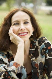 Bust Shot, woman looking into camera and Smiling